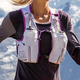Designed for women, the Nathan VaporHowe 4L Vest comes with a couple of small reservoirs for the front pockets, but also includes a back panel that fits a 1.5L reservoir (not included) for extended runs.